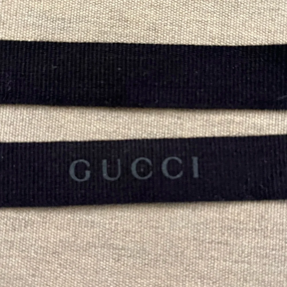 Authentic Gucci Black Embossed Logo Ribbon